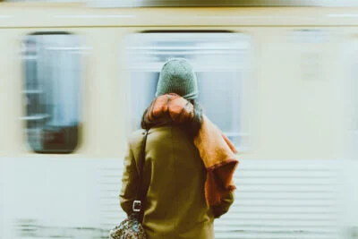 Woman in NYC subway waiting to enter cart - Behind the Scenes NYC