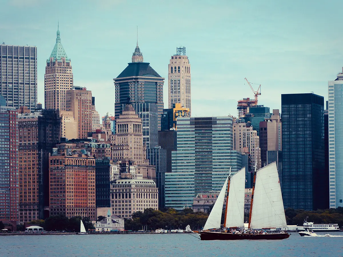 Sailboat with Manhattan's skyline at the back Sailboat with Manhattan's skyline at the back