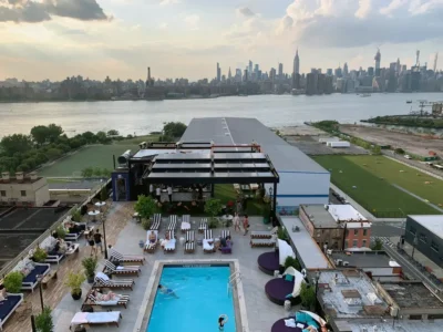 Top of a water house in Williamsburg Brooklyn, with Manhattan's skyline view.